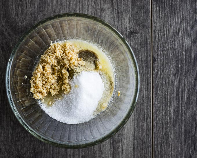 garlic, salt, butter and pepper in a glass bowl